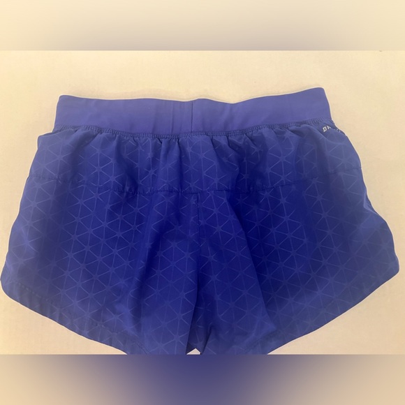 NIKE’S WOMEN’S PURPLE SIZE MEDIUM RUNNING SHORTS DRI FIT - Picture 2 of 6